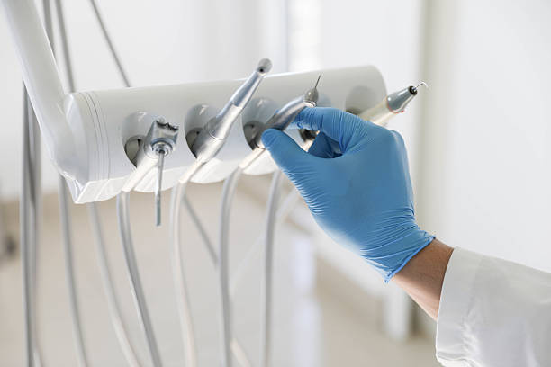 Professional Tooth Extraction technician working in Caldwell Parish County, LA